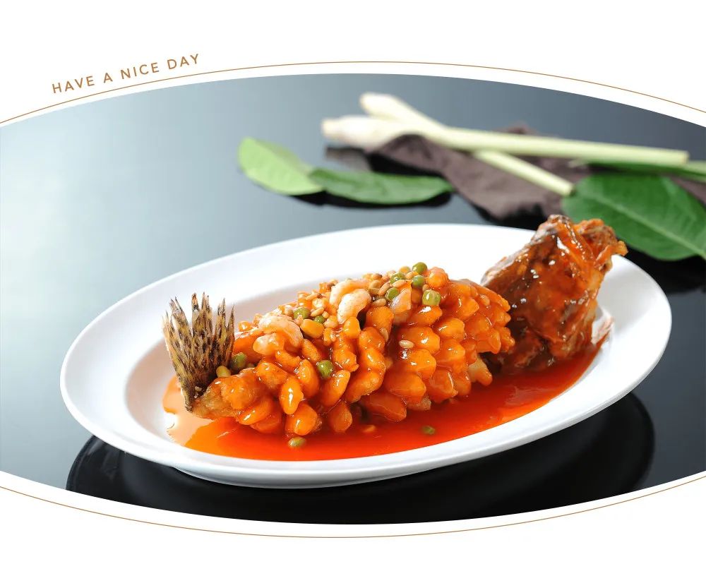 Image of Squirrel Fish, a famous Chinese dish from Jiangsu cuisine, featuring a deep-fried fish with sweet and sour sauce.