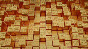 A wide-angle view of a mosaic made up of Chinese characters, each character etched into individual golden cubes creating a 3D effect.