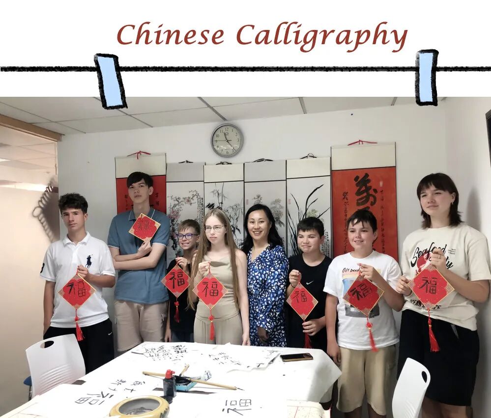 Students practicing calligraphy at Mandarin Zone Beijing